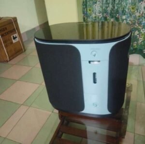 Home oxygen concentrator on a wooden stand